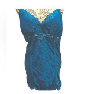 Prussian blue camisole with ribbing and intricate detailing.
